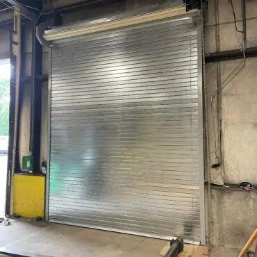 Commercial aluminum overhead garage door installation