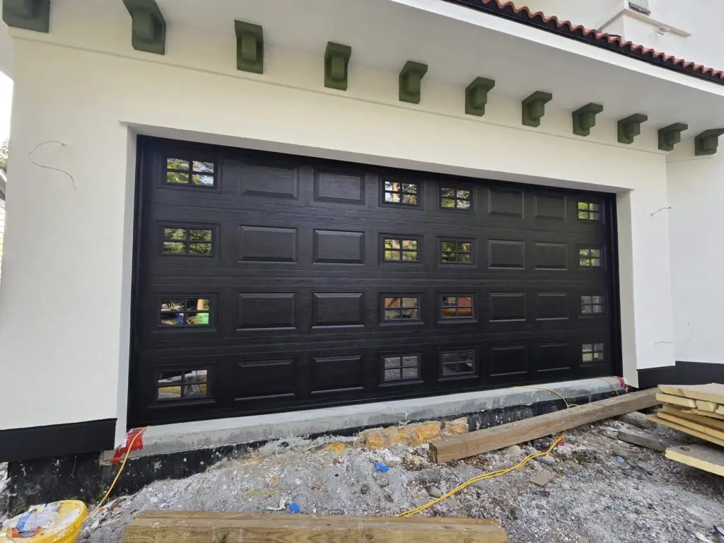 Carriage-Style Residential Garage Door With Decorative Hardware