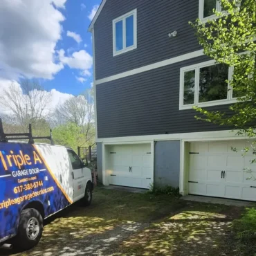 Residential garage door installation with decorative windows – Triple A Garage Door MA