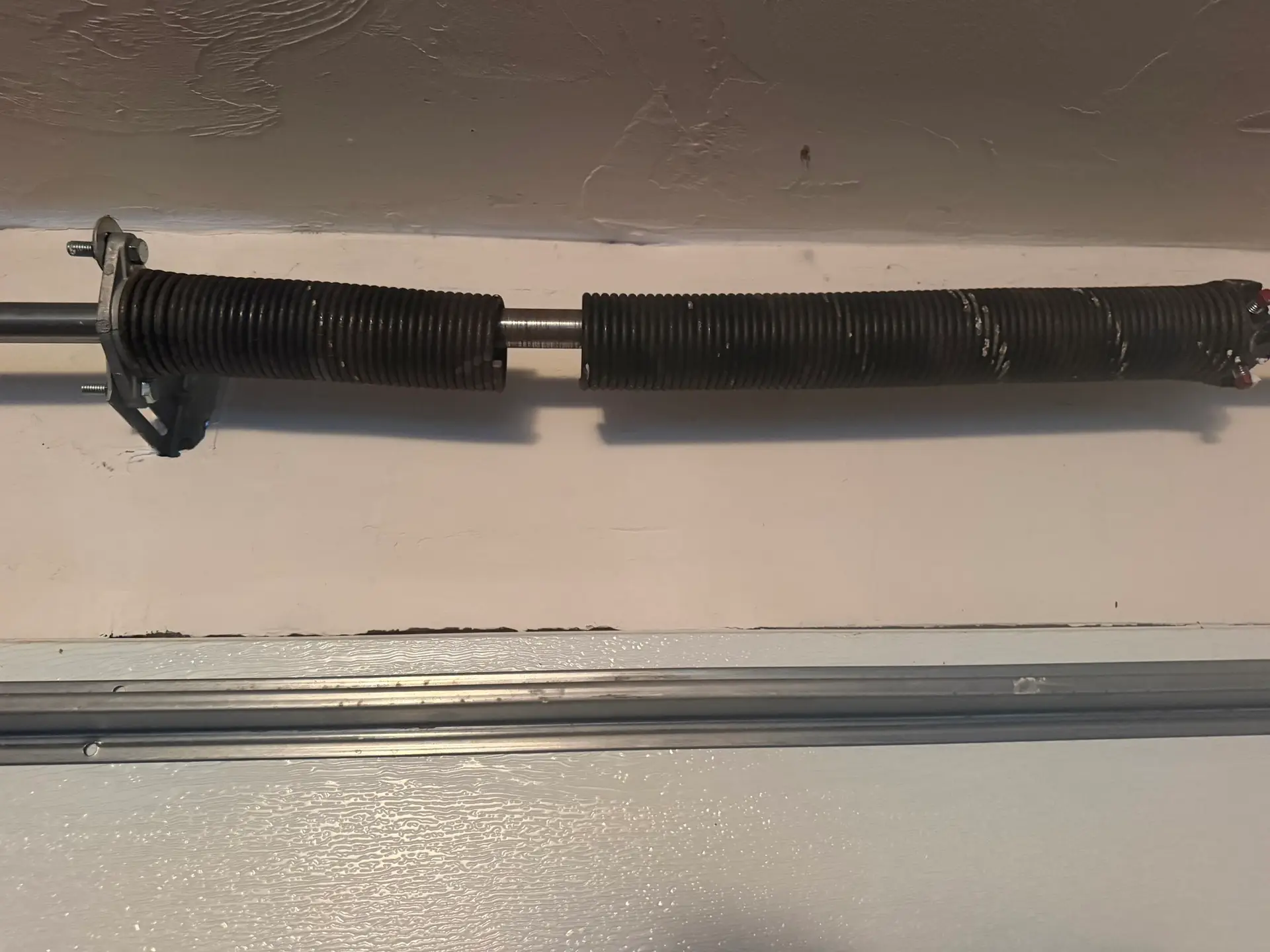 Broken Garage Door Spring? We Can Help. 1 Broken Gaeage Door Spring